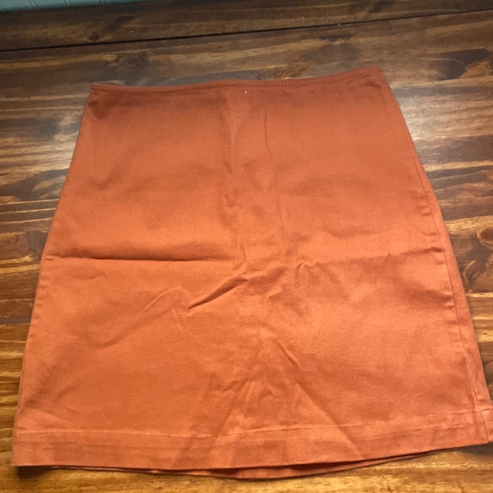 burgundy orang mini skirt, size small. only been worn 1 time